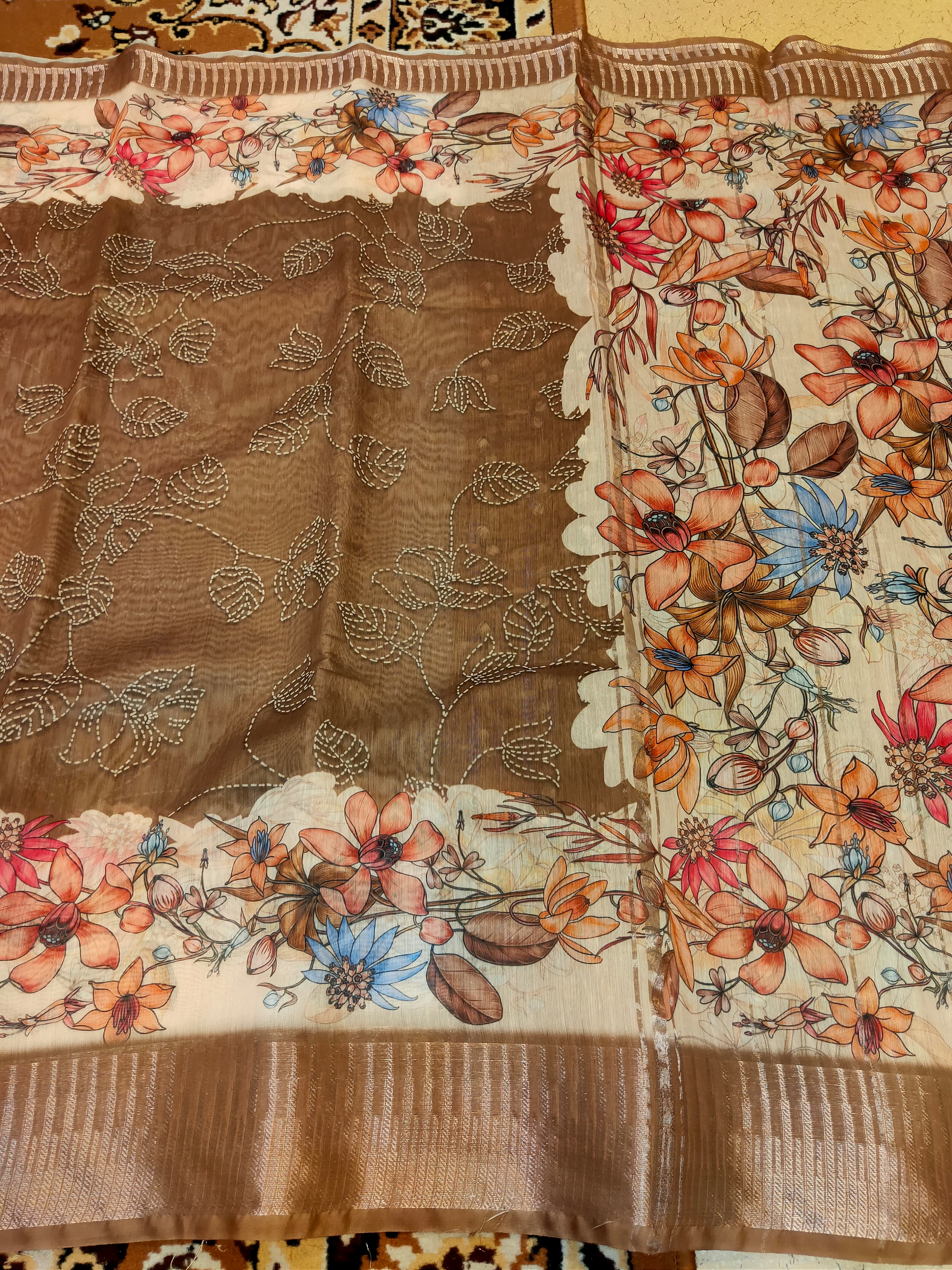 Brown fabric with floral patterns on a yellow background