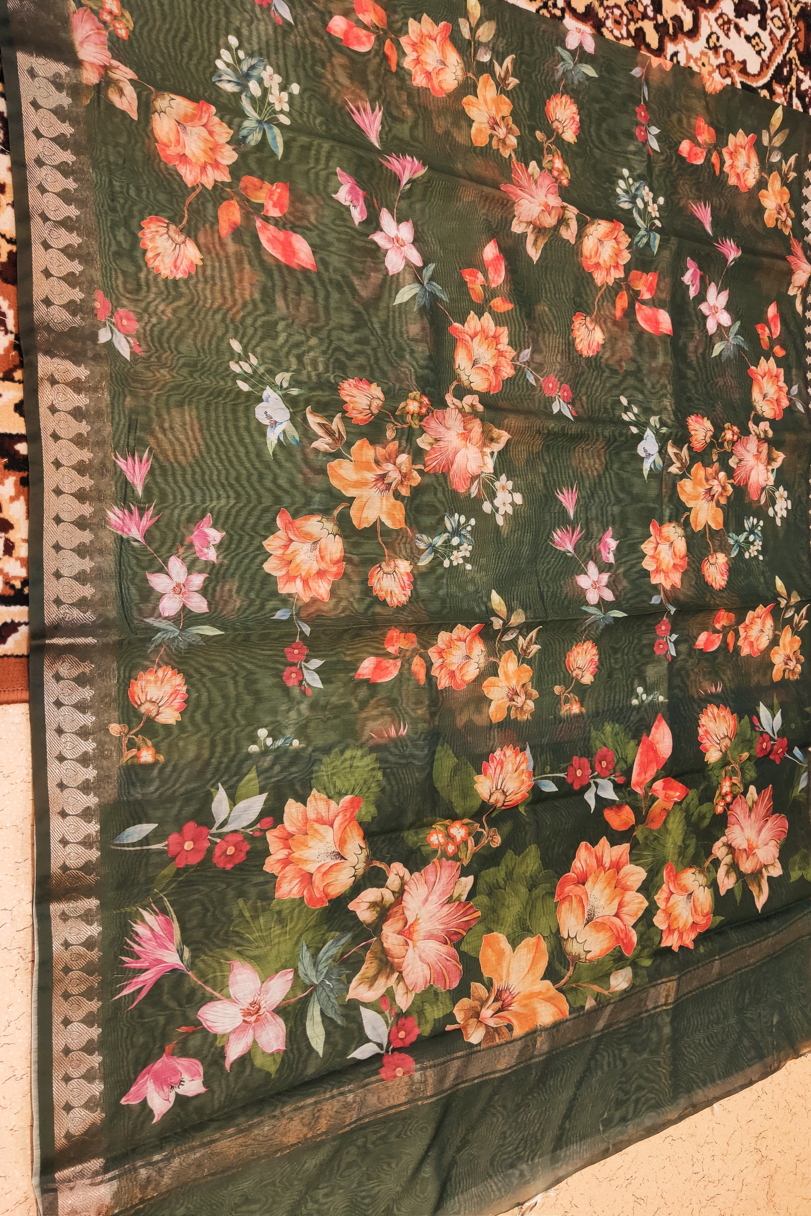 Floral patterned fabric on a flat surface