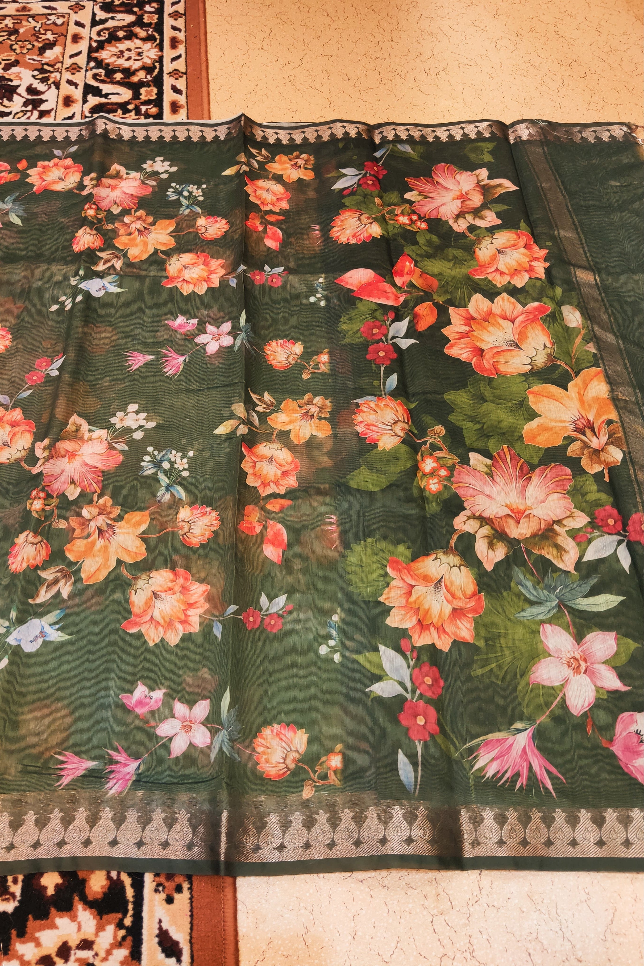 Floral patterned fabric on a wooden floor