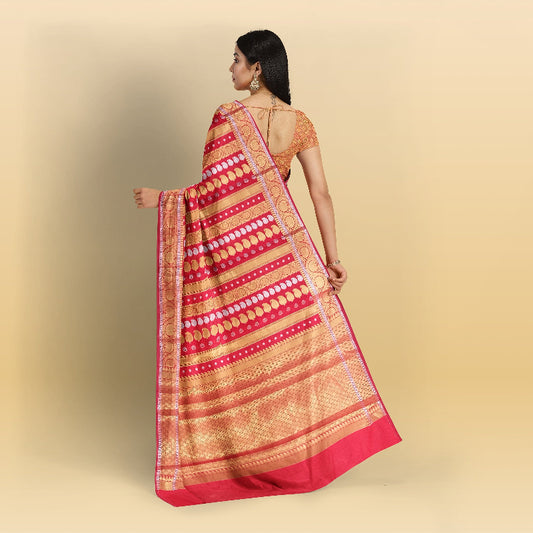 Elegant red Banarasi saree inspired by Nita Ambani, featuring premium silk and gold motifs.
