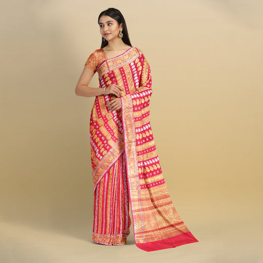 Nita Ambani Inspired Red Banarasi Saree with intricate gold zari work from The Sangam Silks.