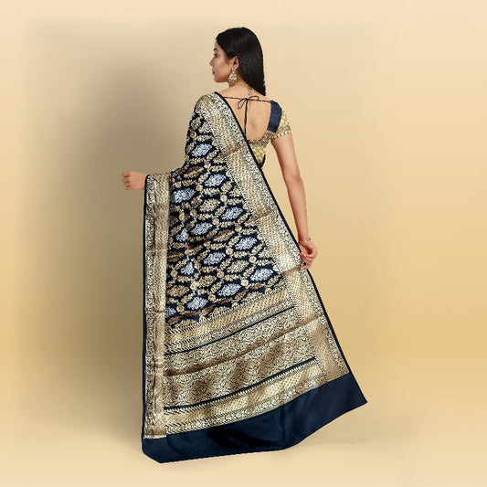 Elegant black Banarasi saree inspired by Nita Ambani, featuring luxurious silk and detailed zari work.